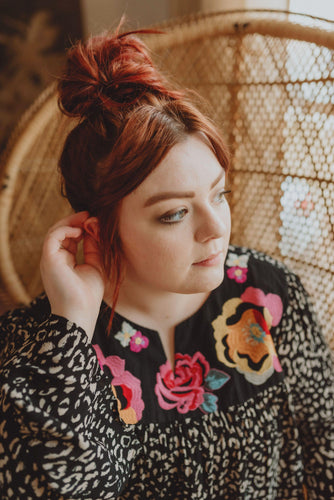 black and white plus size women's top with flowers